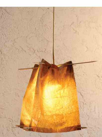 This modern lampshade reuses plastic shopping bags